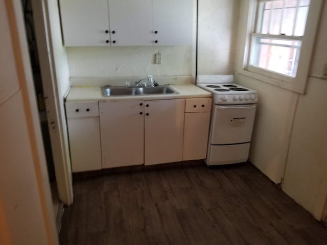 503-505 E 2nd St Unit 503, Chillicothe, OH 45601 - kitchen featuring electric stove, a sink, dark wood-style flooring, light countertops, and white cabinetry