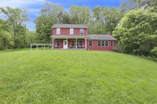 7485 Sugar Grove Rd SE, Sugar Grove, OH 43155 - colonial-style house with covered porch, a front lawn, and a chimney