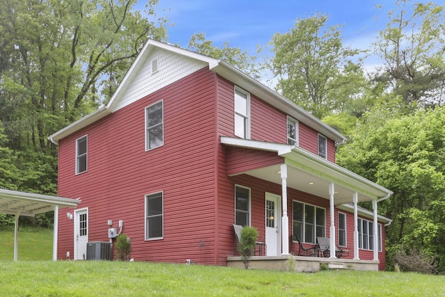 7485 Sugar Grove Rd SE, Sugar Grove, OH 43155 - view of front of property with a porch, a front yard, and central air condition unit