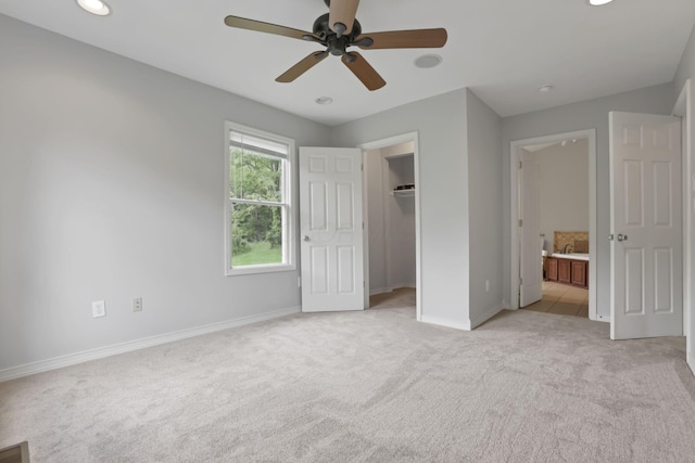 7485 Sugar Grove Rd SE, Sugar Grove, OH 43155 - unfurnished bedroom featuring light colored carpet, baseboards, connected bathroom, recessed lighting, and a closet