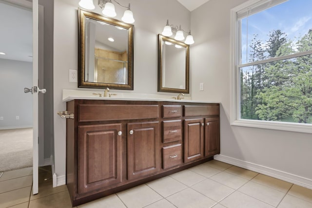7485 Sugar Grove Rd SE, Sugar Grove, OH 43155 - full bathroom with double vanity, tile patterned floors, baseboards, and a shower