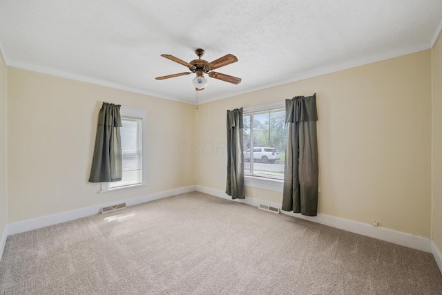 482 E Farming St, Marion, OH 43302 - carpeted spare room with a ceiling fan, ornamental molding, and baseboards
