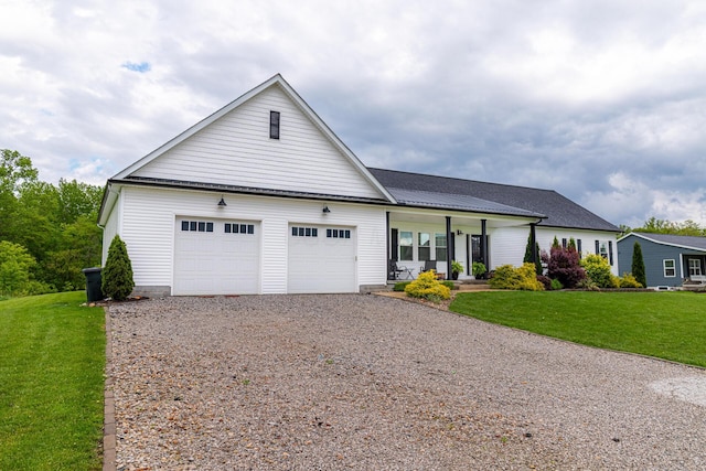 471 Quaker Trce, Marengo, OH 43334 - view of front of property featuring driveway, a front yard, a garage, and a porch