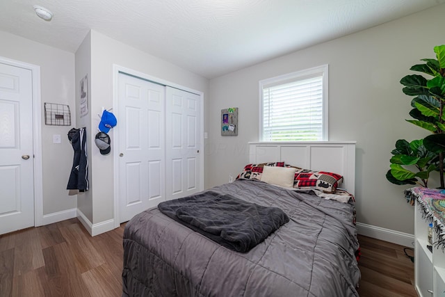 471 Quaker Trce, Marengo, OH 43334 - bedroom with wood finished floors, baseboards, and a closet