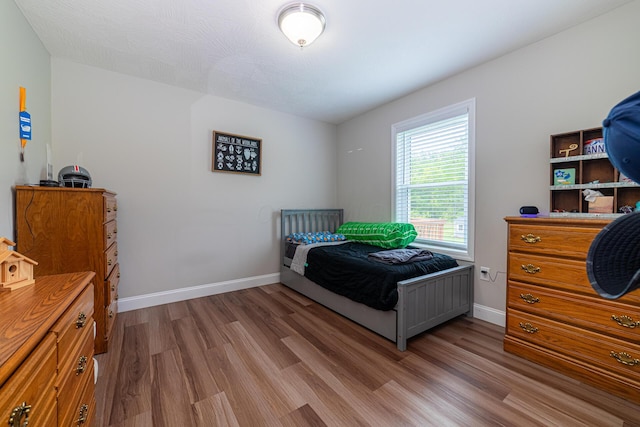 471 Quaker Trce, Marengo, OH 43334 - bedroom featuring wood finished floors and baseboards