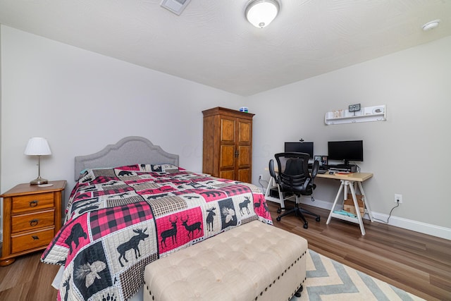 471 Quaker Trce, Marengo, OH 43334 - bedroom with wood finished floors, baseboards, and a desk