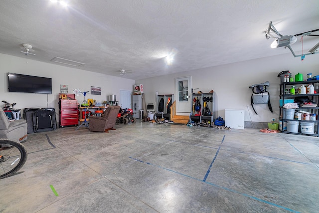 471 Quaker Trce, Marengo, OH 43334 - garage featuring a garage door opener