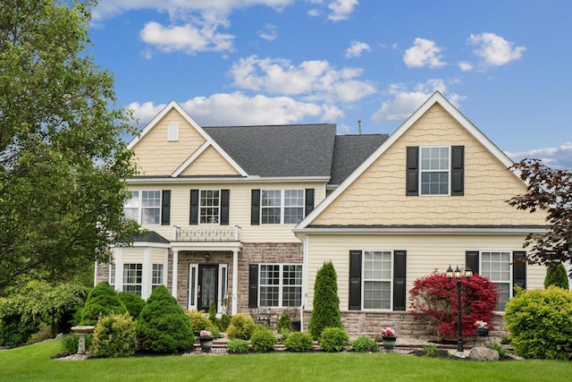 161 Calumet Ct, Ostrander, OH 43061 - traditional home featuring a front lawn and stone siding
