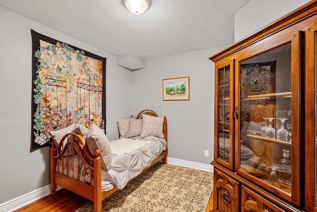 161 Calumet Ct, Ostrander, OH 43061 - bedroom featuring baseboards and wood finished floors