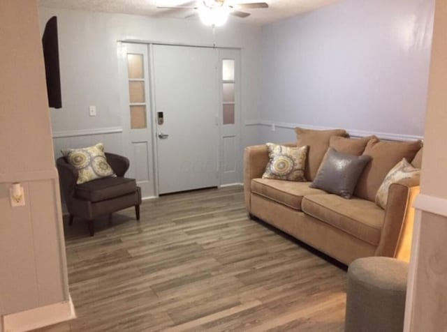 661 E 11th Ave, Columbus, OH 43211 - living area with a ceiling fan and wood finished floors