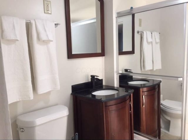 661 E 11th Ave, Columbus, OH 43211 - bathroom with toilet and vanity