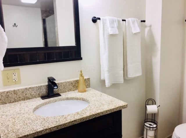 661 E 11th Ave, Columbus, OH 43211 - bathroom with vanity and toilet