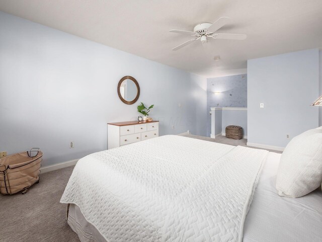 38 Ironclad Dr, Columbus, OH 43213 - bedroom featuring light carpet, baseboards, and a ceiling fan