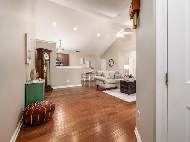 38 Ironclad Dr, Columbus, OH 43213 - living area featuring a ceiling fan, high vaulted ceiling, hardwood / wood-style floors, baseboards, and recessed lighting