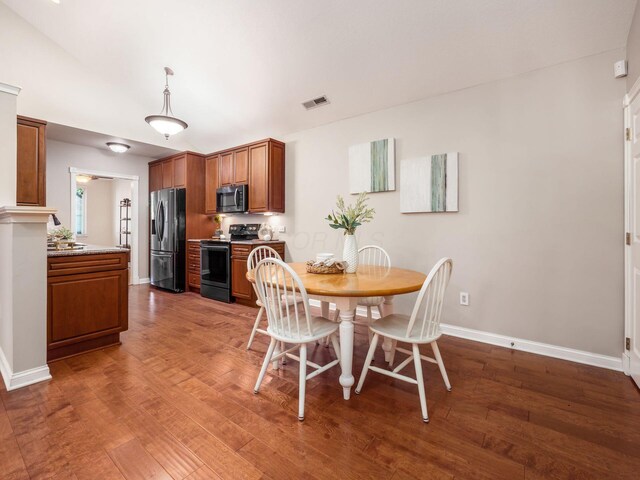 38 Ironclad Dr, Columbus, OH 43213 - dining area featuring baseboards and wood finished floors
