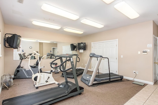 38 Ironclad Dr, Columbus, OH 43213 - exercise room featuring tile patterned floors and baseboards
