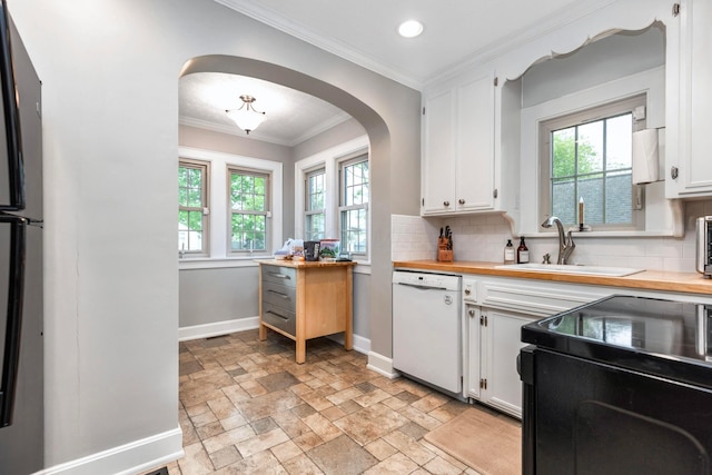 750 E Allen St, Lancaster, OH 43130 - kitchen with dishwasher, electric range, baseboards, arched walkways, and butcher block countertops