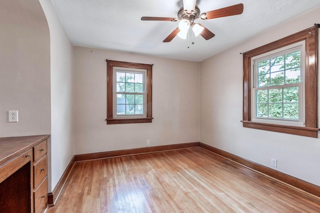 750 E Allen St, Lancaster, OH 43130 - empty room featuring plenty of natural light, light wood-style flooring, baseboards, and a ceiling fan