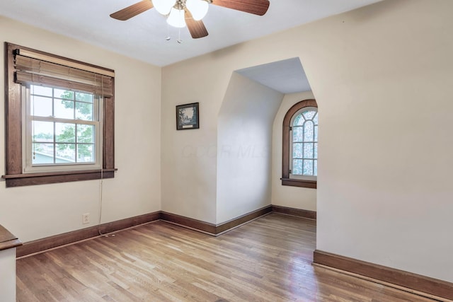 750 E Allen St, Lancaster, OH 43130 - empty room featuring healthy amount of natural light, light wood finished floors, baseboards, and a ceiling fan