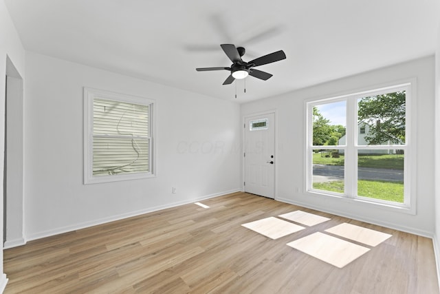 3129 Mcguffey Rd, Columbus, OH 43224 - entryway with light wood-style flooring and a ceiling fan