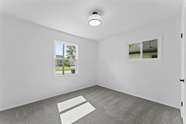 3129 Mcguffey Rd, Columbus, OH 43224 - carpeted empty room featuring baseboards