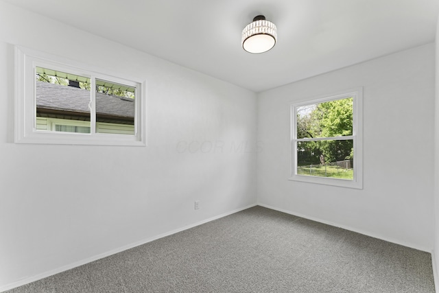 3129 Mcguffey Rd, Columbus, OH 43224 - empty room with carpet and baseboards