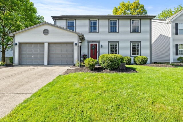1997 Sutter Pkwy, Dublin, OH 43016 - view of front of home featuring an attached garage, concrete driveway, and a front yard