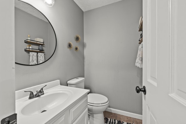 1997 Sutter Pkwy, Dublin, OH 43016 - half bathroom featuring toilet, a textured ceiling, vanity, and baseboards
