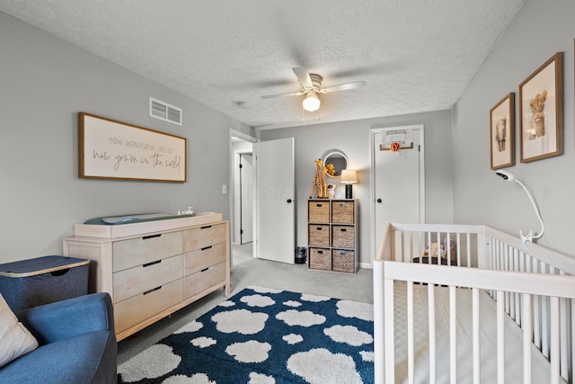 1997 Sutter Pkwy, Dublin, OH 43016 - bedroom featuring light colored carpet, a textured ceiling, and ceiling fan