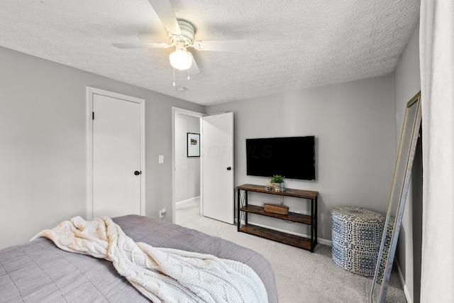 1997 Sutter Pkwy, Dublin, OH 43016 - carpeted bedroom with a textured ceiling, ceiling fan, and baseboards