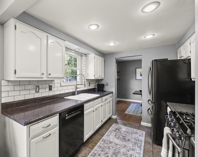 1997 Sutter Pkwy, Dublin, OH 43016 - kitchen with dishwasher, stainless steel range with gas cooktop, a sink, white cabinetry, and decorative backsplash