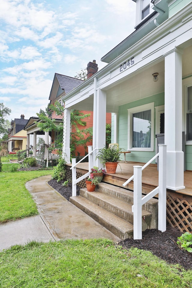 2045 N 4th St, Columbus, OH 43201 - entrance to property featuring a porch and a chimney