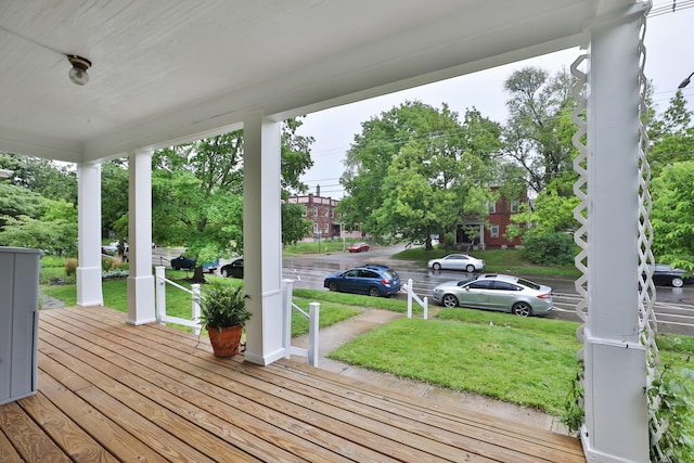 2045 N 4th St, Columbus, OH 43201 - wooden porch with a lawn