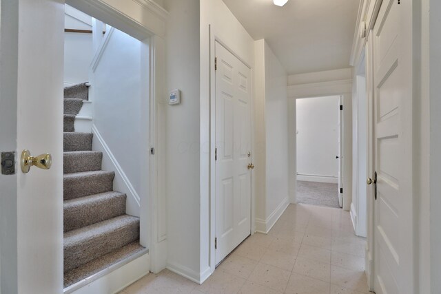 2045 N 4th St, Columbus, OH 43201 - hallway featuring stairs and baseboards