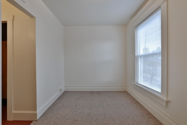 2045 N 4th St, Columbus, OH 43201 - carpeted spare room with healthy amount of natural light and baseboards