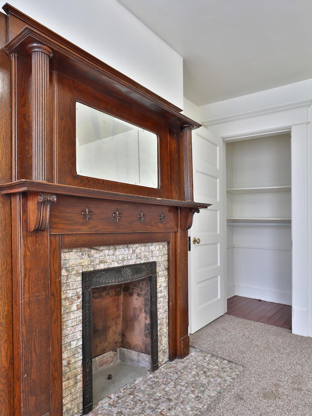 2045 N 4th St, Columbus, OH 43201 - detailed view of a fireplace and carpet flooring