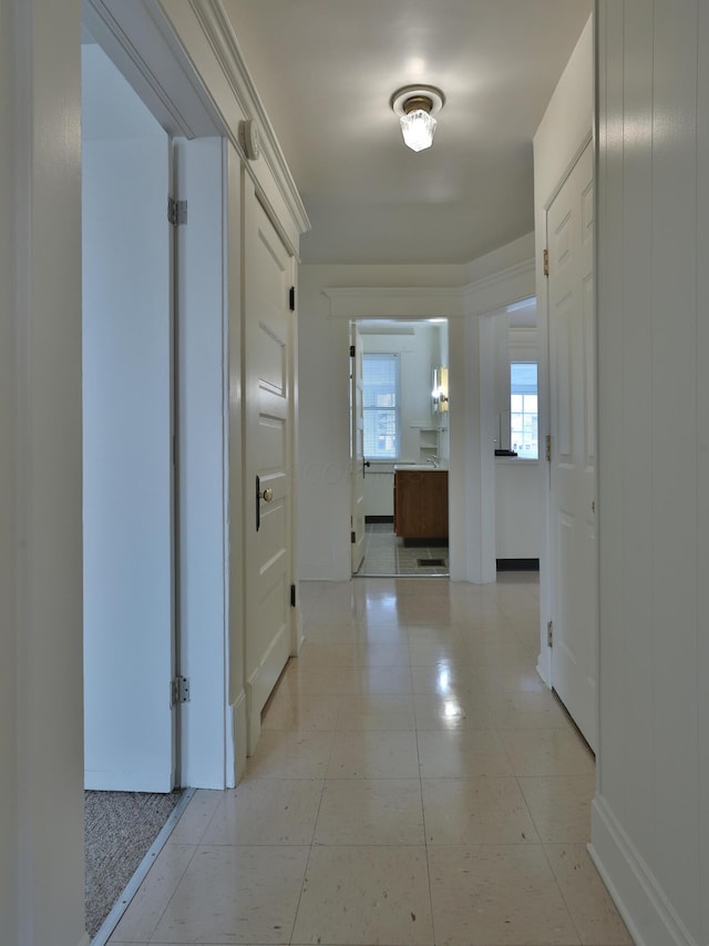 2045 N 4th St, Columbus, OH 43201 - hallway featuring baseboards and light tile patterned flooring