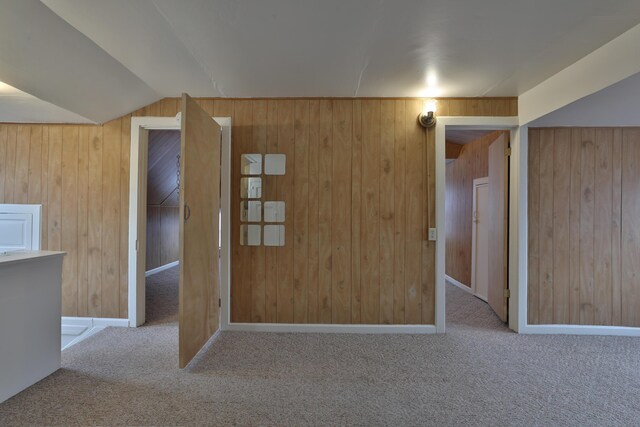2045 N 4th St, Columbus, OH 43201 - additional living space with carpet, wooden walls, and lofted ceiling