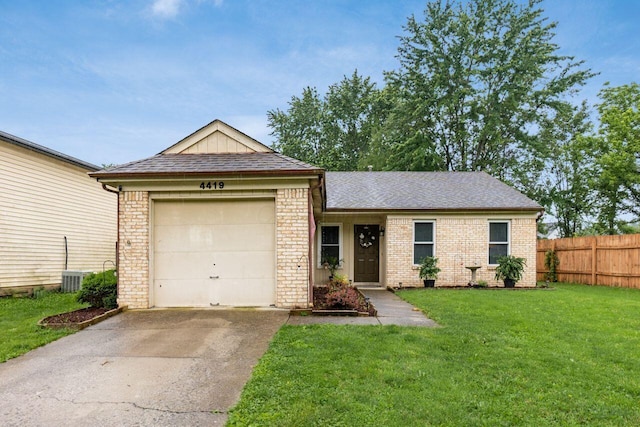 4419 Trindel Way, Columbus, OH 43231 - ranch-style house with concrete driveway, brick siding, and an attached garage