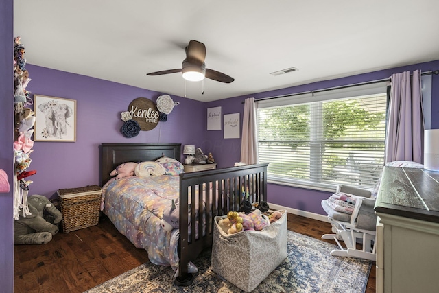 21171 River Rd, Circleville, OH 43113 - bedroom featuring wood finished floors, a ceiling fan, and baseboards