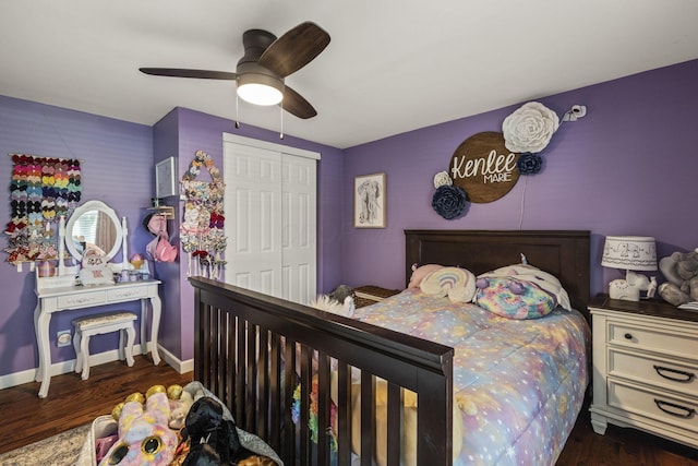 21171 River Rd, Circleville, OH 43113 - bedroom with wood finished floors, a closet, a ceiling fan, and baseboards