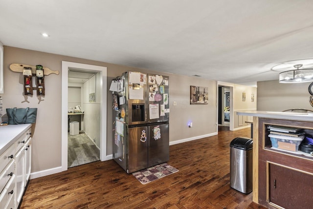21171 River Rd, Circleville, OH 43113 - kitchen featuring stainless steel refrigerator with ice dispenser, dark wood finished floors, baseboards, light countertops, and recessed lighting