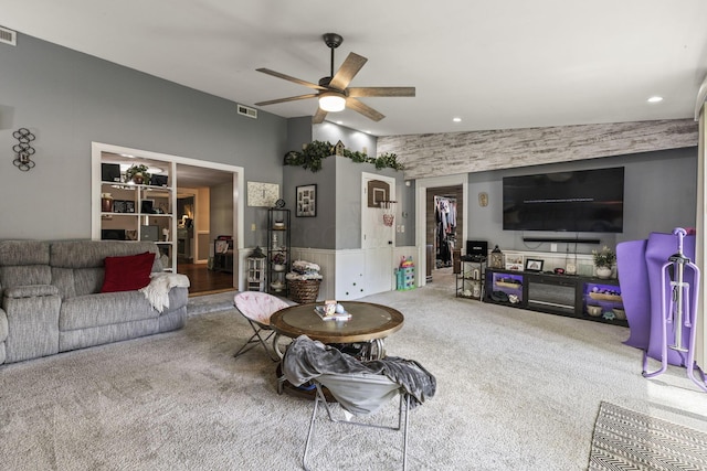 21171 River Rd, Circleville, OH 43113 - living area featuring a ceiling fan, carpet floors, a wainscoted wall, and recessed lighting