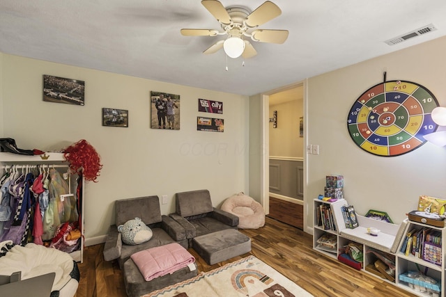 21171 River Rd, Circleville, OH 43113 - living room featuring a ceiling fan and wood finished floors