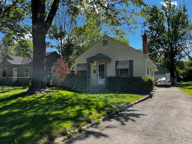 2428 Bancroft St, Columbus, OH 43211 - view of front of home featuring a chimney