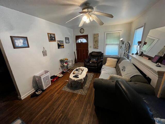 2428 Bancroft St, Columbus, OH 43211 - living room featuring wood finished floors, ceiling fan, and baseboards