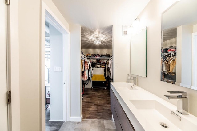 367 Auden Ave Unit 306, Columbus, OH 43215 - full bathroom with double vanity and a walk in closet
