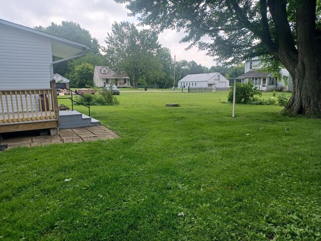 4891 Marion Mount Gilead Rd, Caledonia, OH 43314 - view of grassy yard with a wooden deck