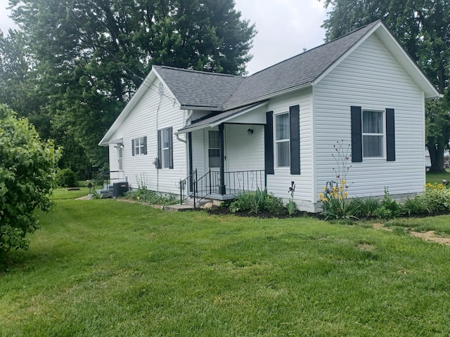 4891 Marion Mount Gilead Rd, Caledonia, OH 43314 - bungalow featuring a shingled roof and a front yard