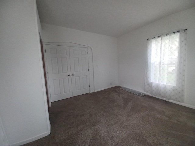 4891 Marion Mount Gilead Rd, Caledonia, OH 43314 - unfurnished bedroom with carpet flooring, a closet, and baseboards